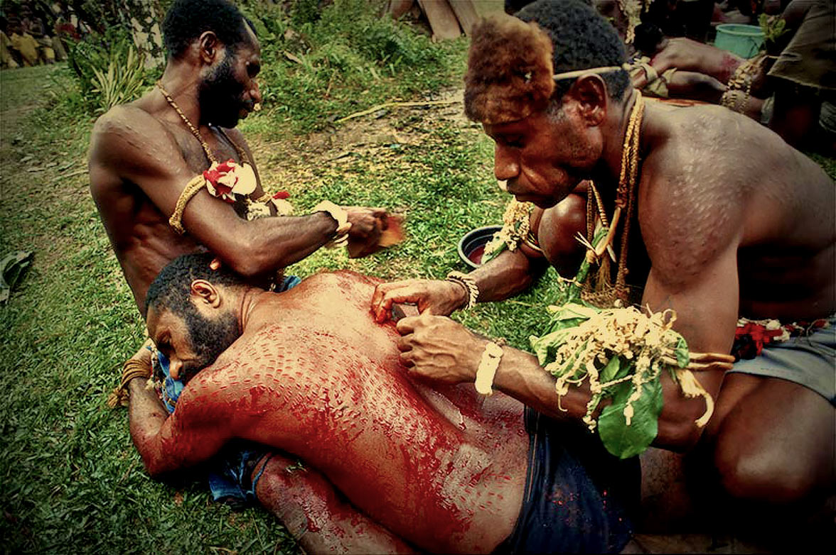 Crocodile men of Papua New Guinea via Seal Superyachts.
