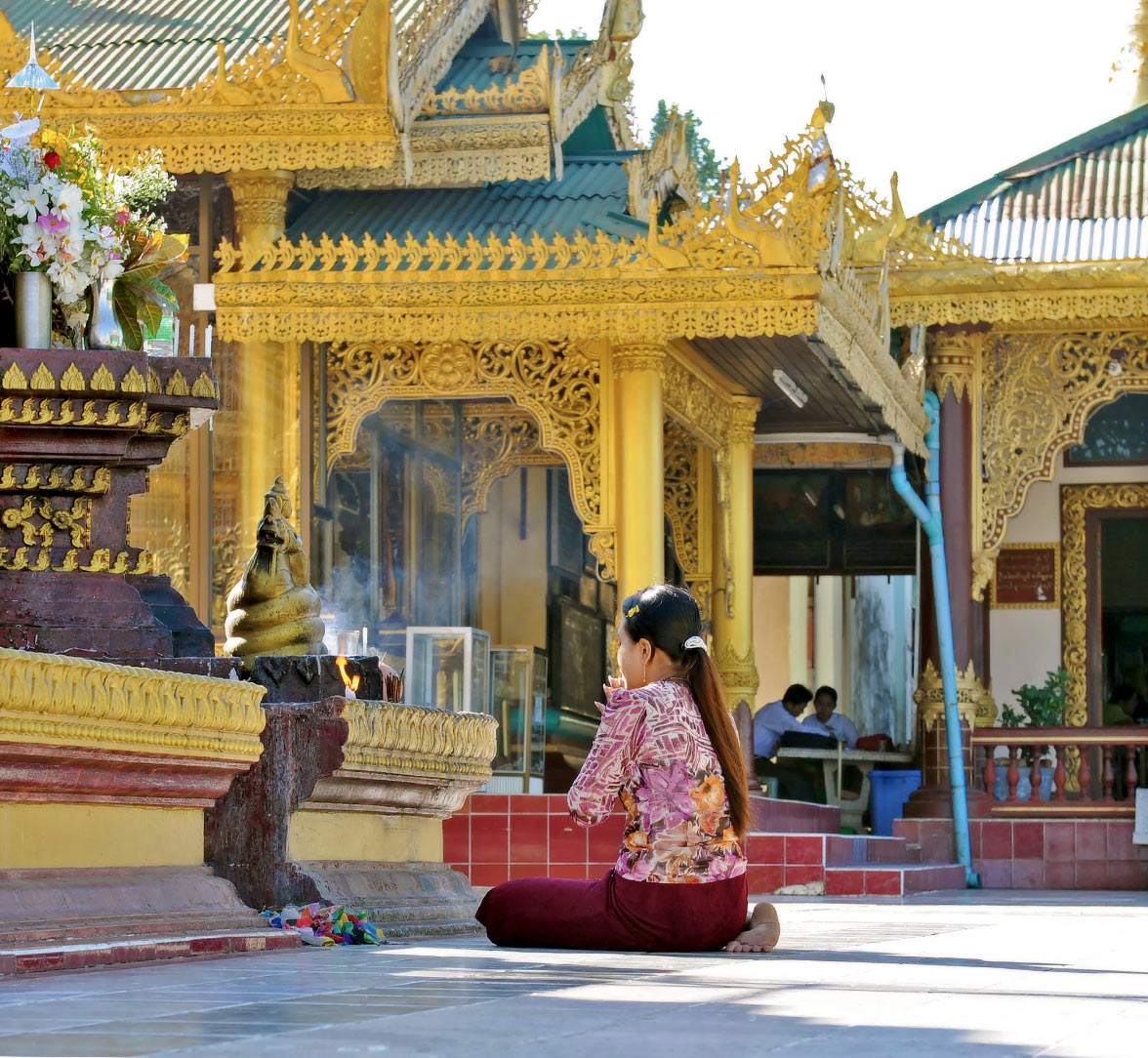 Buddhist praying in temple in Myeik Myanmar