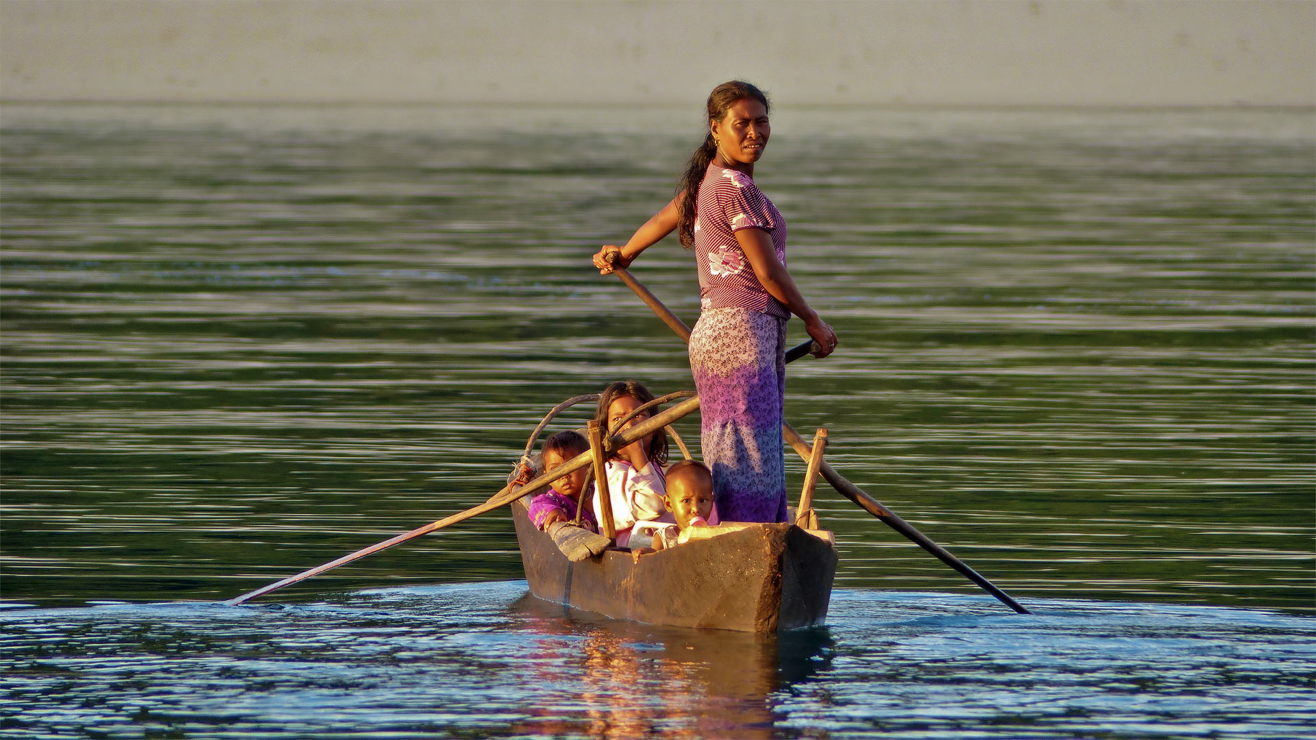 Family in boat in Myanmar by Seal Superyachts