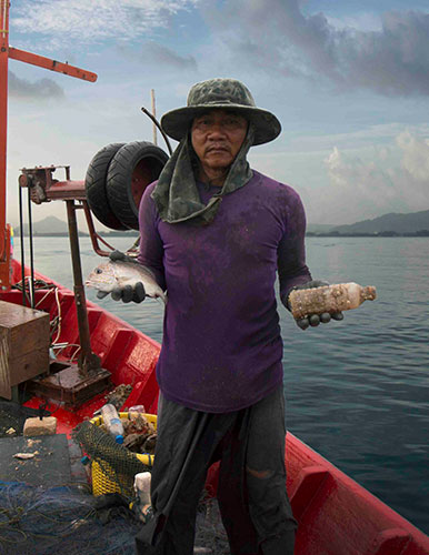 Thai fisherman in Phuket, Thailand.